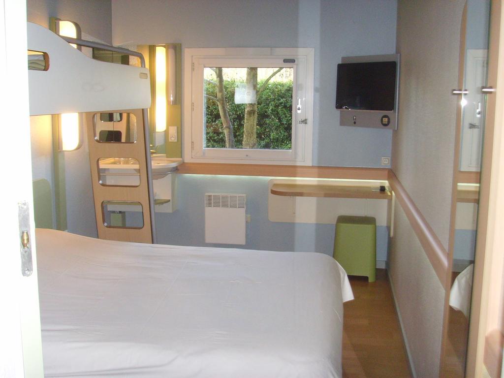 ibis budget L'Isle Adam Ruang foto