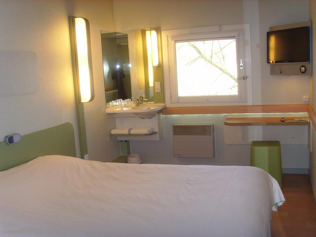 ibis budget L'Isle Adam Ruang foto